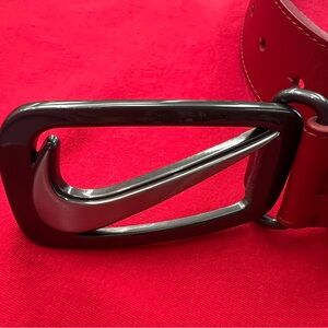 Nike leather women’s Belt in Red with black  and silver buckle